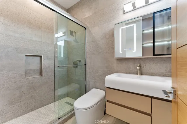 a view of living room filled with furniture and wooden floor