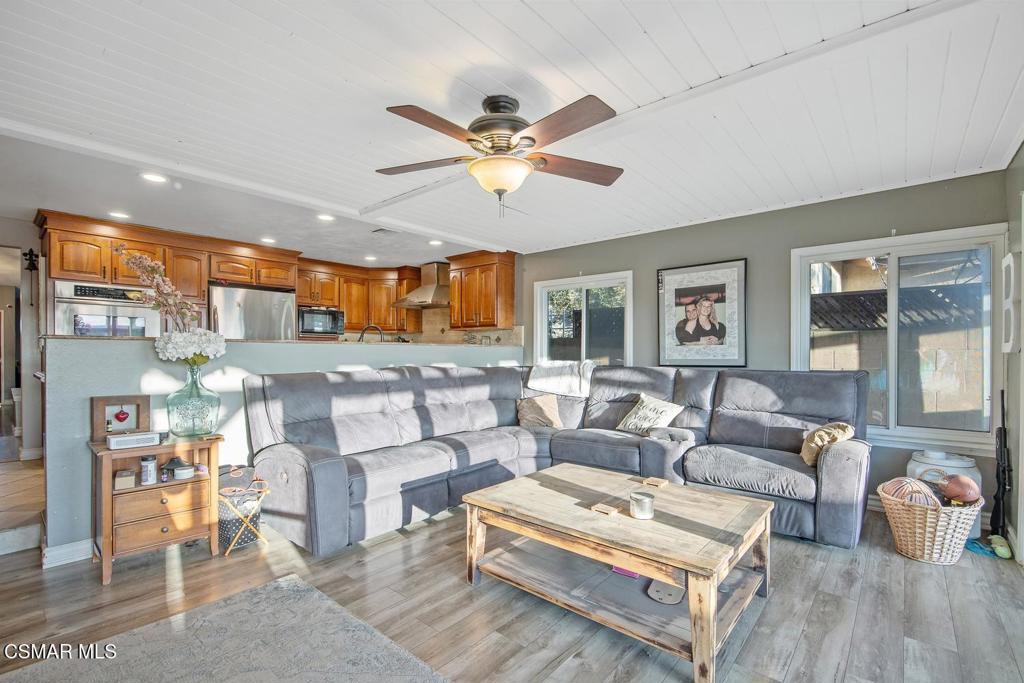 4787 North Buttercreek Road Moorpark, CA 93021 - Photo 15 of 31 a living room with furniture and a large window