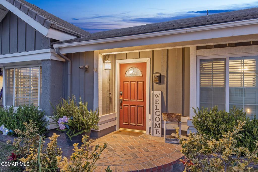 4787 North Buttercreek Road Moorpark, CA 93021 - Photo 2 of 31 a view of a porch with chairs and potted plants