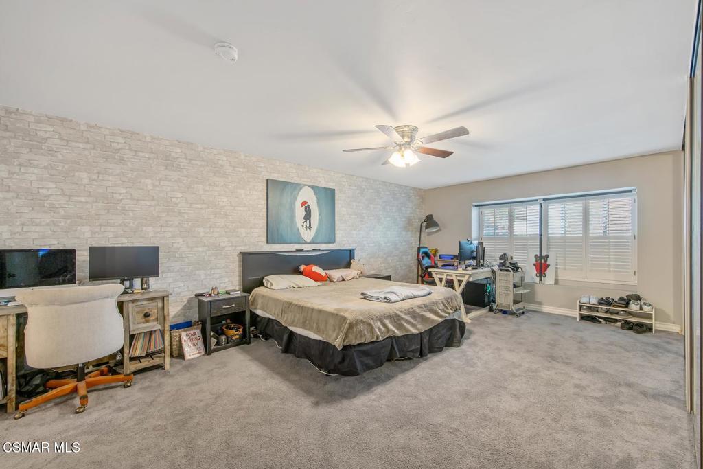 4787 North Buttercreek Road Moorpark, CA 93021 - Photo 23 of 31 a living room with furniture and white walls