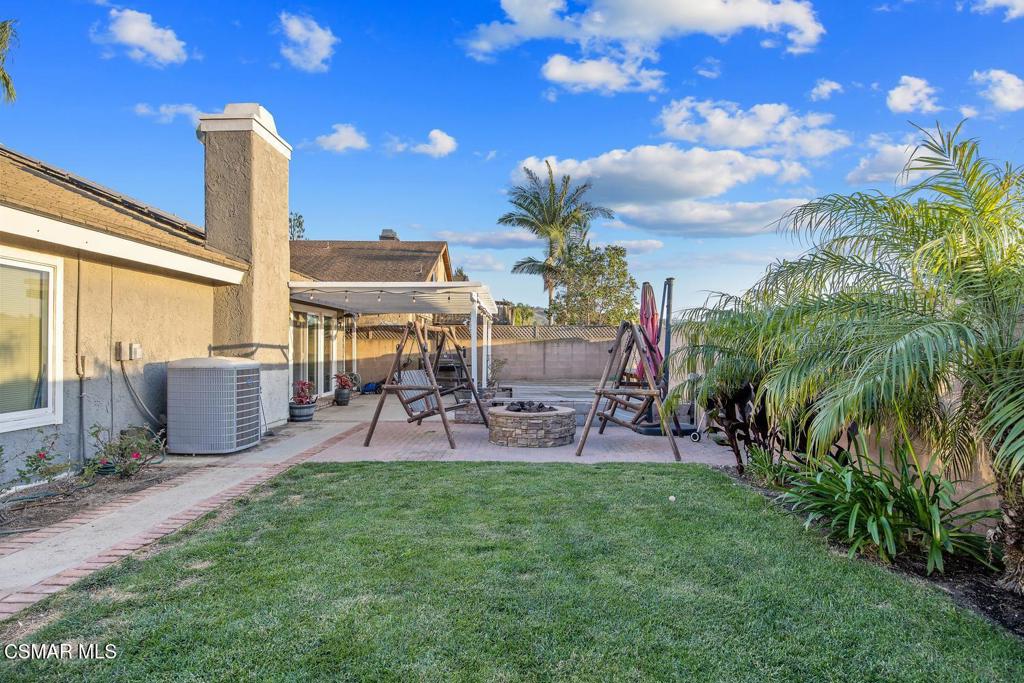 4787 North Buttercreek Road Moorpark, CA 93021 - Photo 30 of 31 a view of a backyard with sitting area