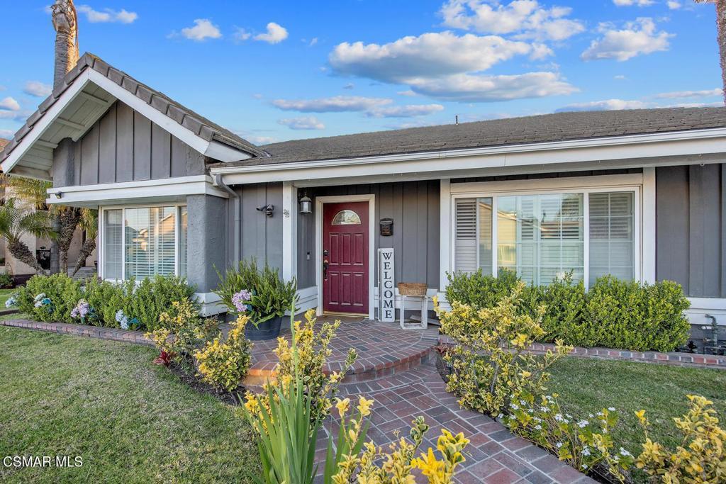4787 North Buttercreek Road Moorpark, CA 93021 - Photo 4 of 31 a front view of a house with a yard