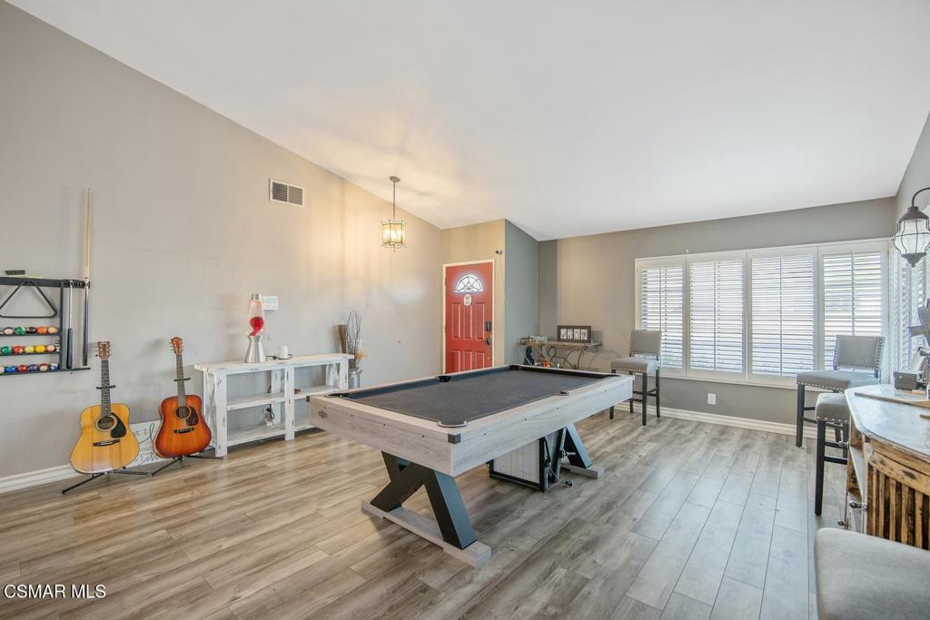 4787 North Buttercreek Road Moorpark, CA 93021 - Photo 5 of 31 a living room with furniture and a table