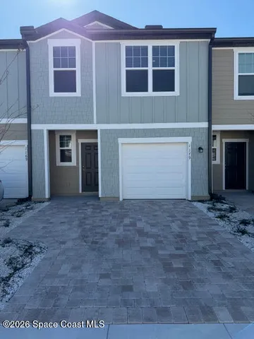 a house view with a outdoor space