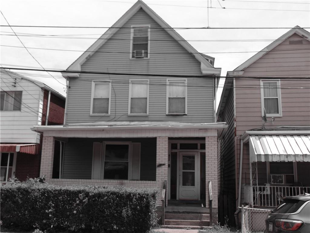 813 8th Street McKees Rocks, PA 15136 - Photo 1 of 1 a front view of a house with balcony