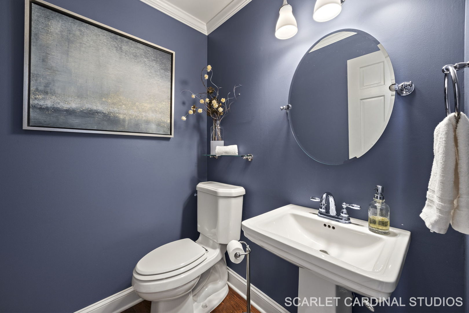 295 Meadowview Lane Aurora, IL 60502 - Photo 15 of 42 a bathroom with a toilet a sink and mirror