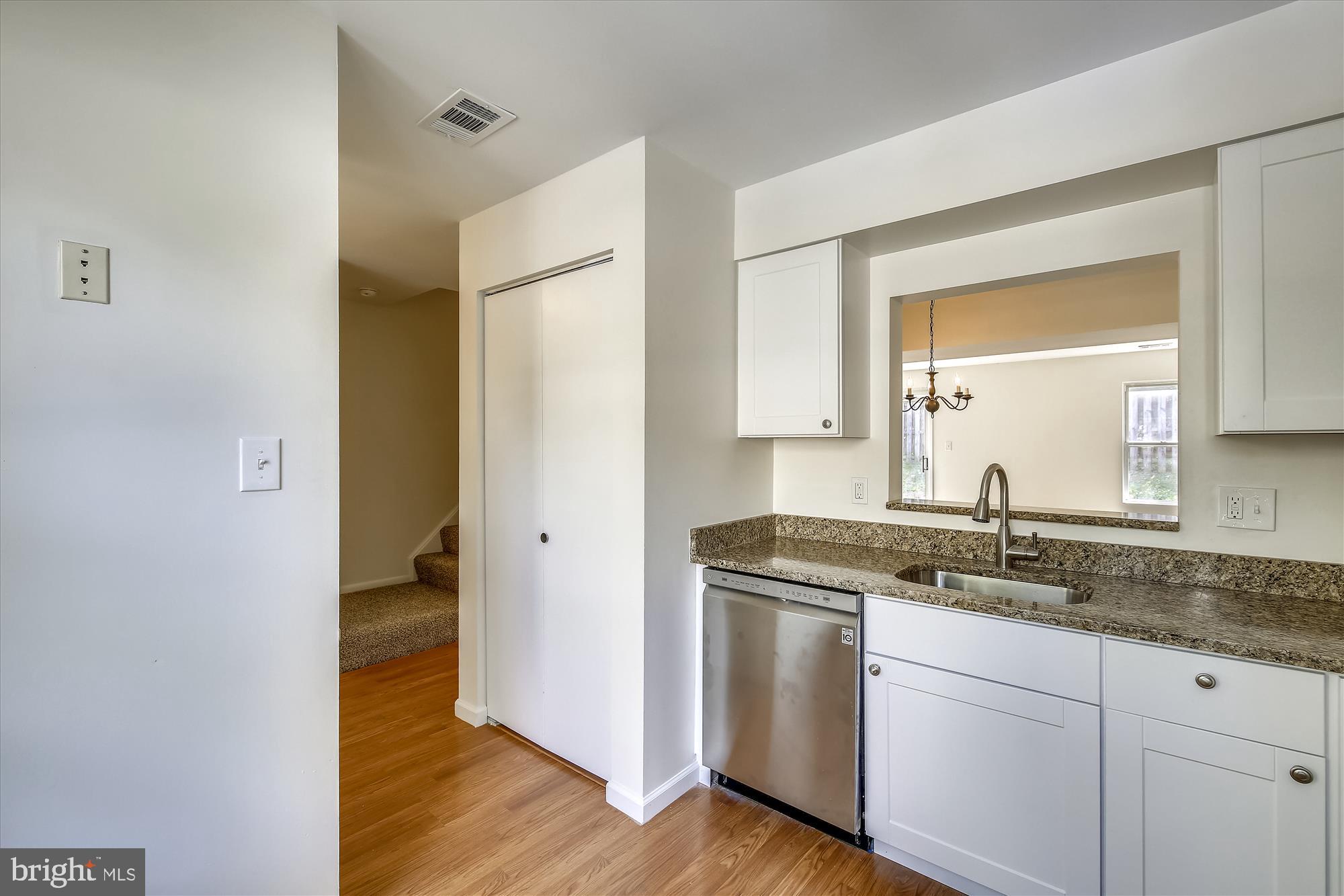 2935 Schoolhouse Circle Silver Spring, MD 20902 - Photo 4 of 31 Kitchen toward foyer - laundry closet on right