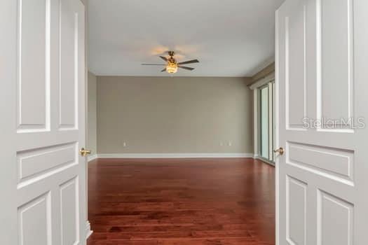3507 Bayshore Boulevard, Unit 302 Tampa, FL 33629 - Photo 12 of 47 wooden floor in an empty room with a window