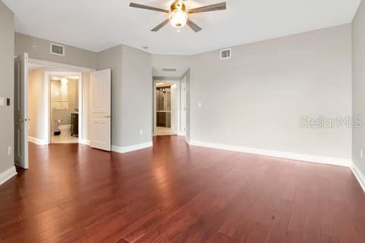 3507 Bayshore Boulevard, Unit 302 Tampa, FL 33629 - Photo 15 of 47 wooden floor in an empty room with a window