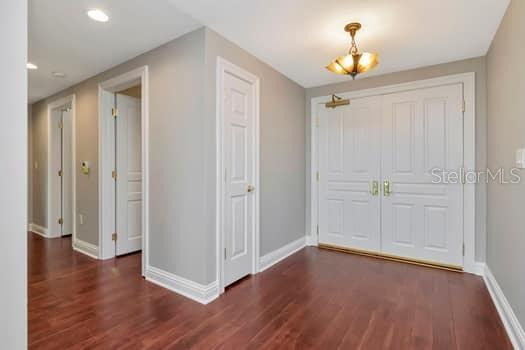 3507 Bayshore Boulevard, Unit 302 Tampa, FL 33629 - Photo 2 of 47 a view of a hallway with wooden floor
