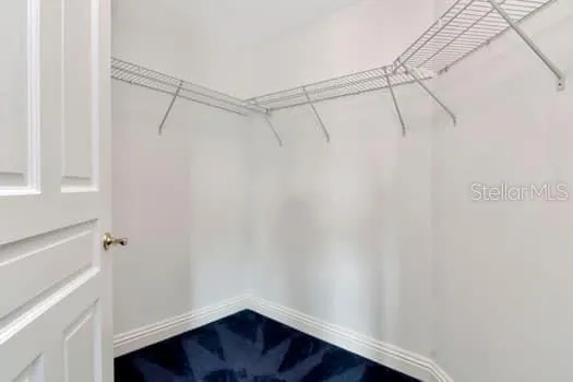 a view of a room with racks on the wall