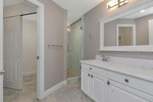 3507 Bayshore Boulevard, Unit 302 Tampa, FL 33629 - Photo 24 of 47 a bathroom with a sink and a mirror
