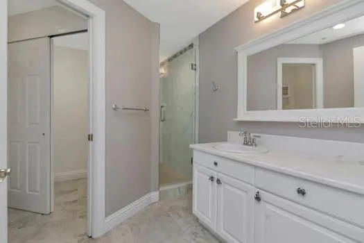 a view of a house with backyard and porch