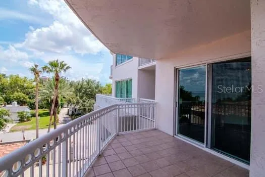 a view of balcony with furniture