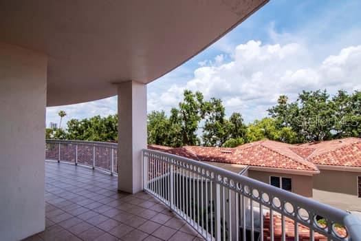 3507 Bayshore Boulevard, Unit 302 Tampa, FL 33629 - Photo 32 of 47 a view of a balcony with wooden fence
