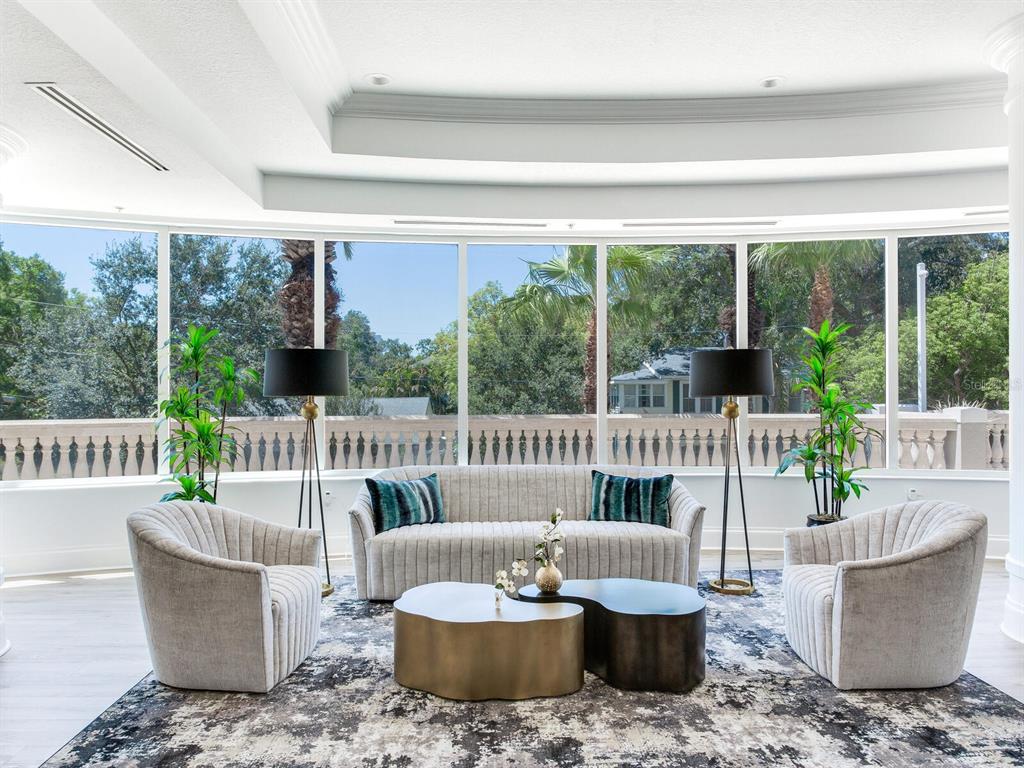 3507 Bayshore Boulevard, Unit 302 Tampa, FL 33629 - Photo 36 of 47 a living room with furniture and a large window