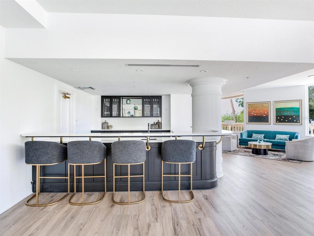 3507 Bayshore Boulevard, Unit 302 Tampa, FL 33629 - Photo 39 of 47 a dining hall with stainless steel appliances granite countertop a stove and a wooden floors