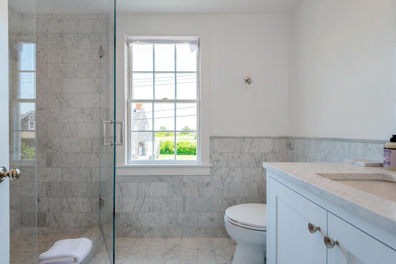 12 Willard Street Nantucket, MA 02554 - Photo 29 of 36 a bathroom with a sink toilet and window
