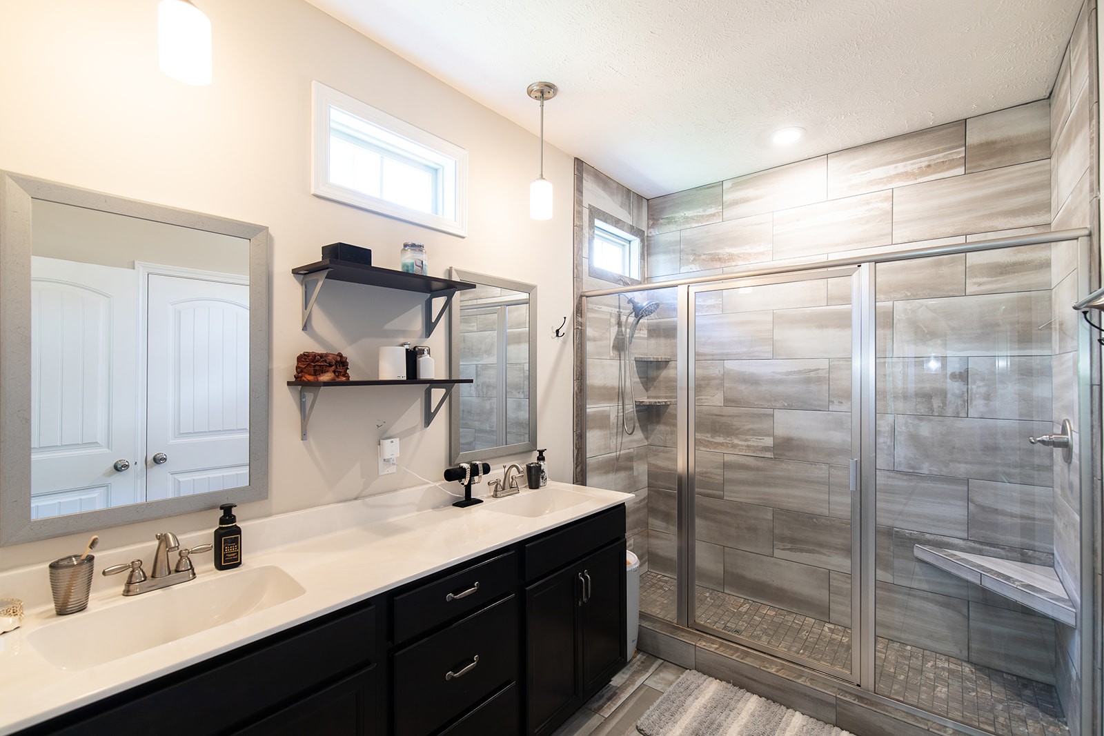 1045 Fuji Lane Clarksville, TN 37040 - Photo 11 of 24 a bathroom with a shower sink and mirror