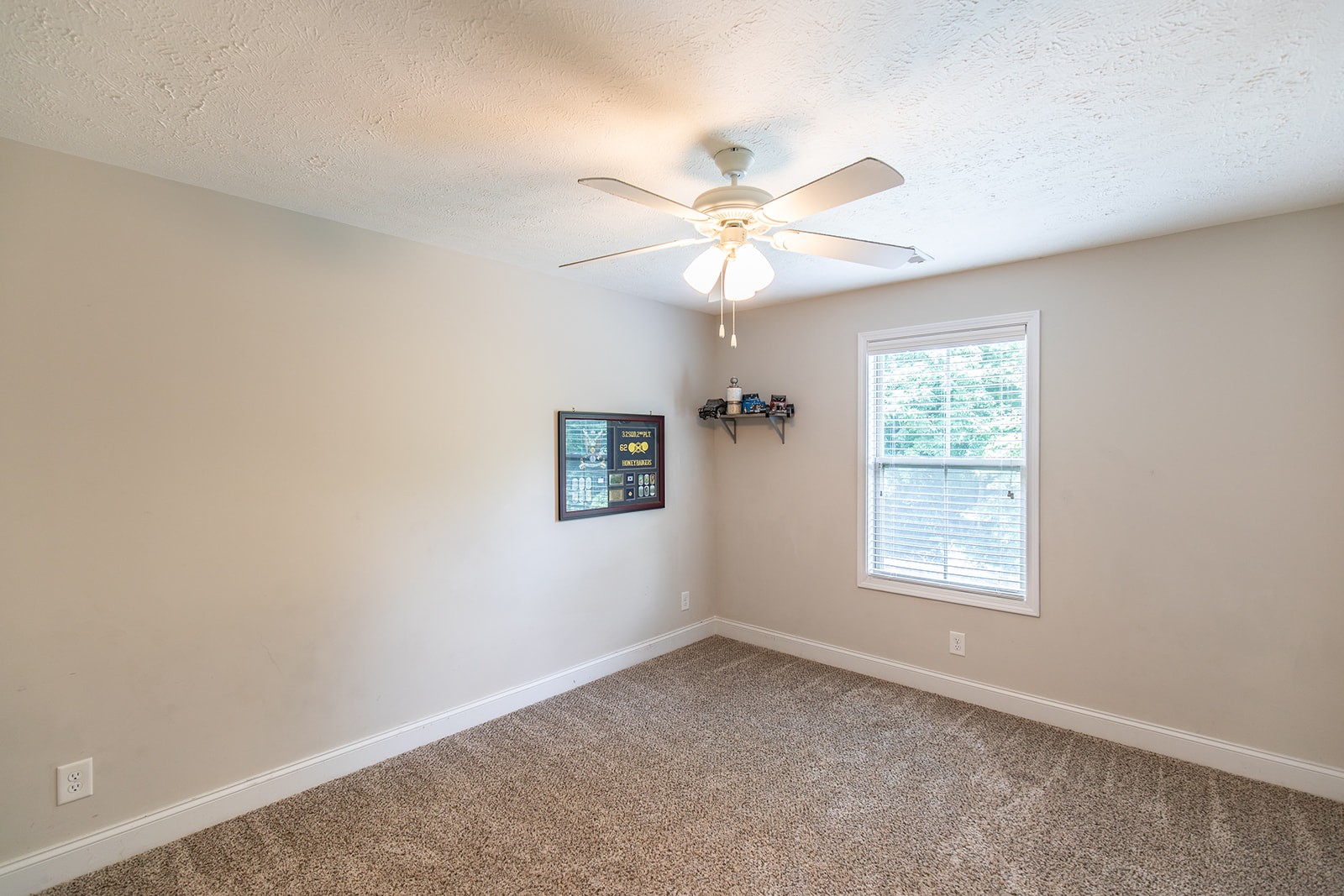 1045 Fuji Lane Clarksville, TN 37040 - Photo 13 of 24 an empty room with a window and a fan