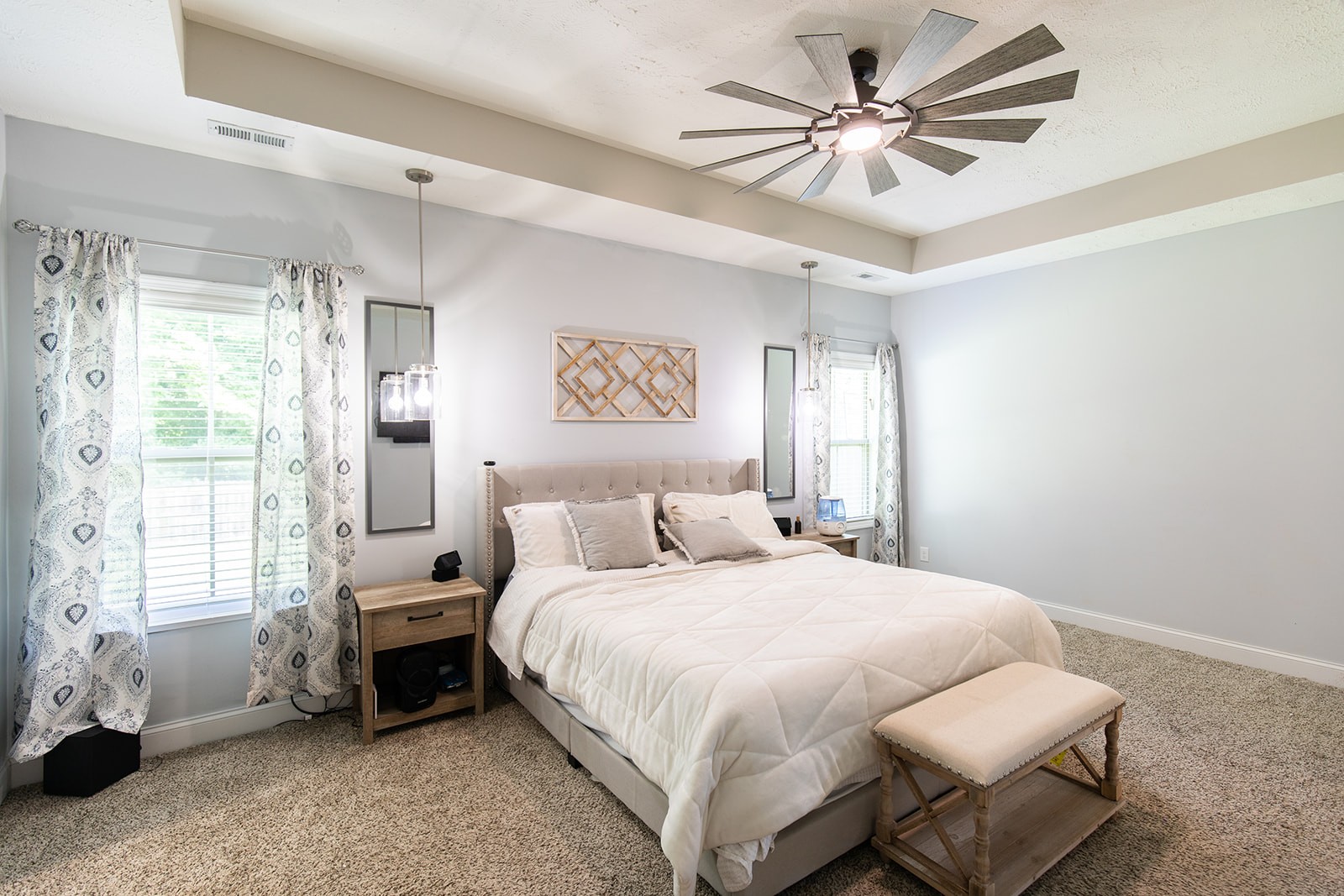 1045 Fuji Lane Clarksville, TN 37040 - Photo 8 of 24 a bedroom with a bed and a chandelier