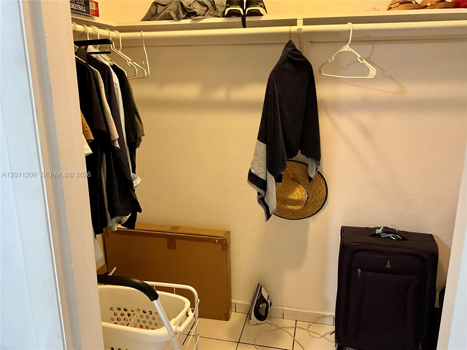 1910 West 56th Street, Unit 3226 Hialeah, FL 33012 - Photo 11 of 21 a close view of walk in closet
