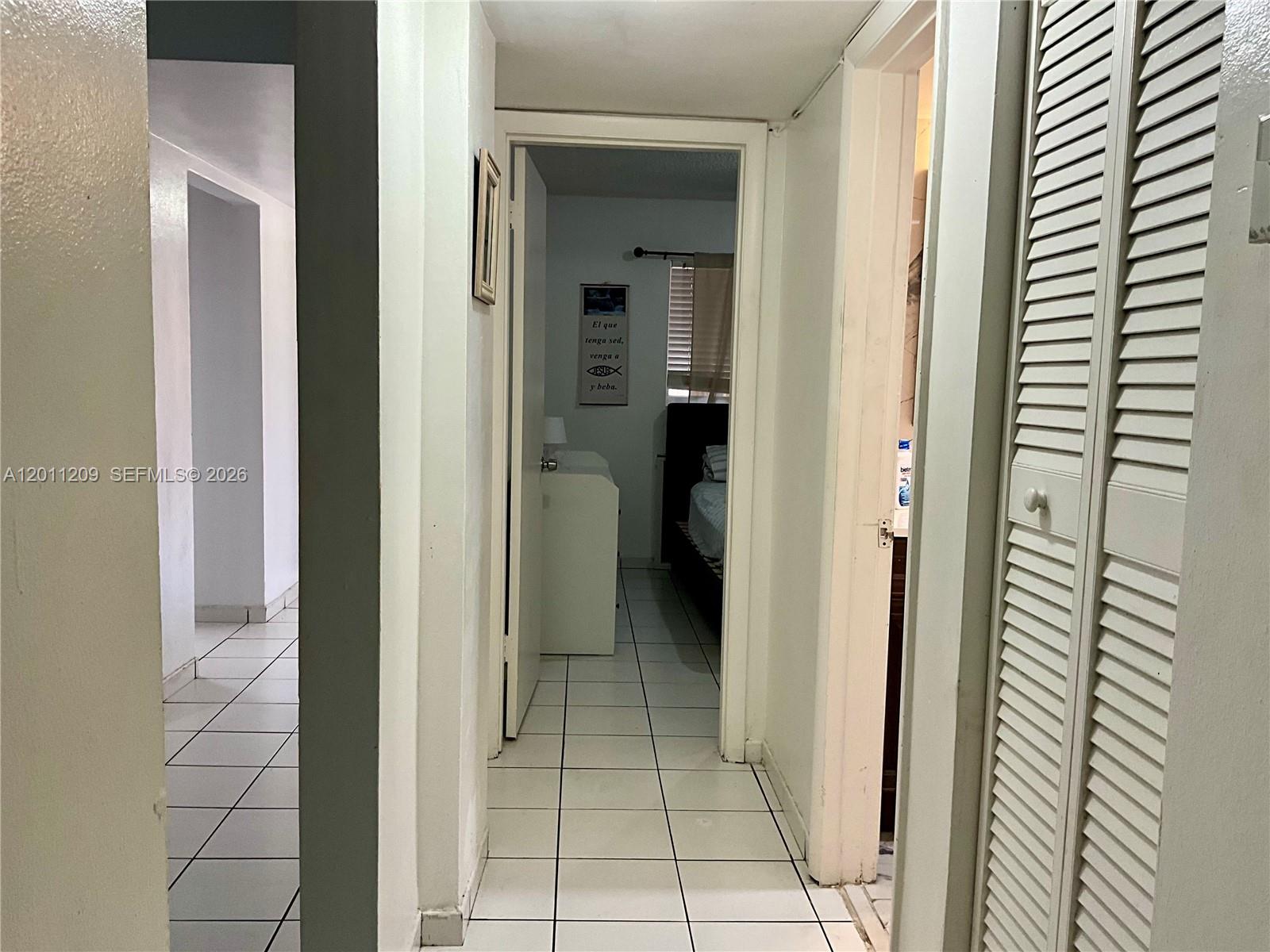 1910 West 56th Street, Unit 3226 Hialeah, FL 33012 - Photo 12 of 21 a view of a hallway and closet