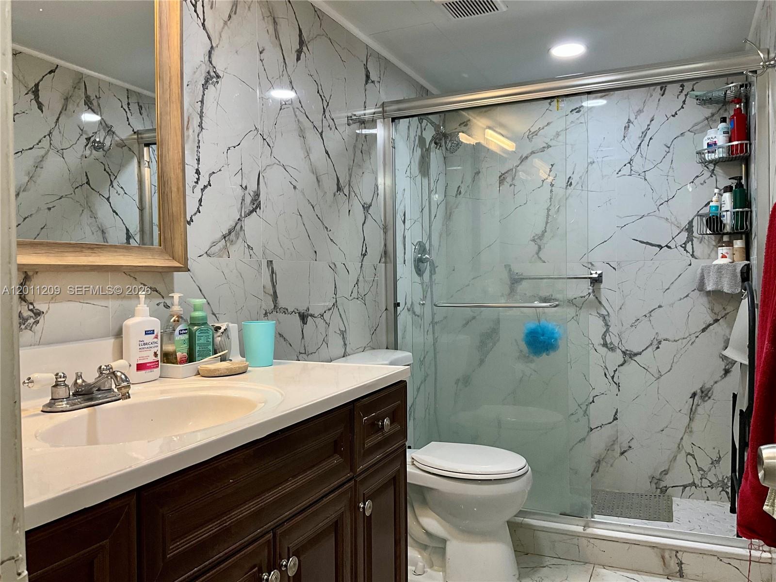 1910 West 56th Street, Unit 3226 Hialeah, FL 33012 - Photo 14 of 21 a bathroom with a sink and a toilet