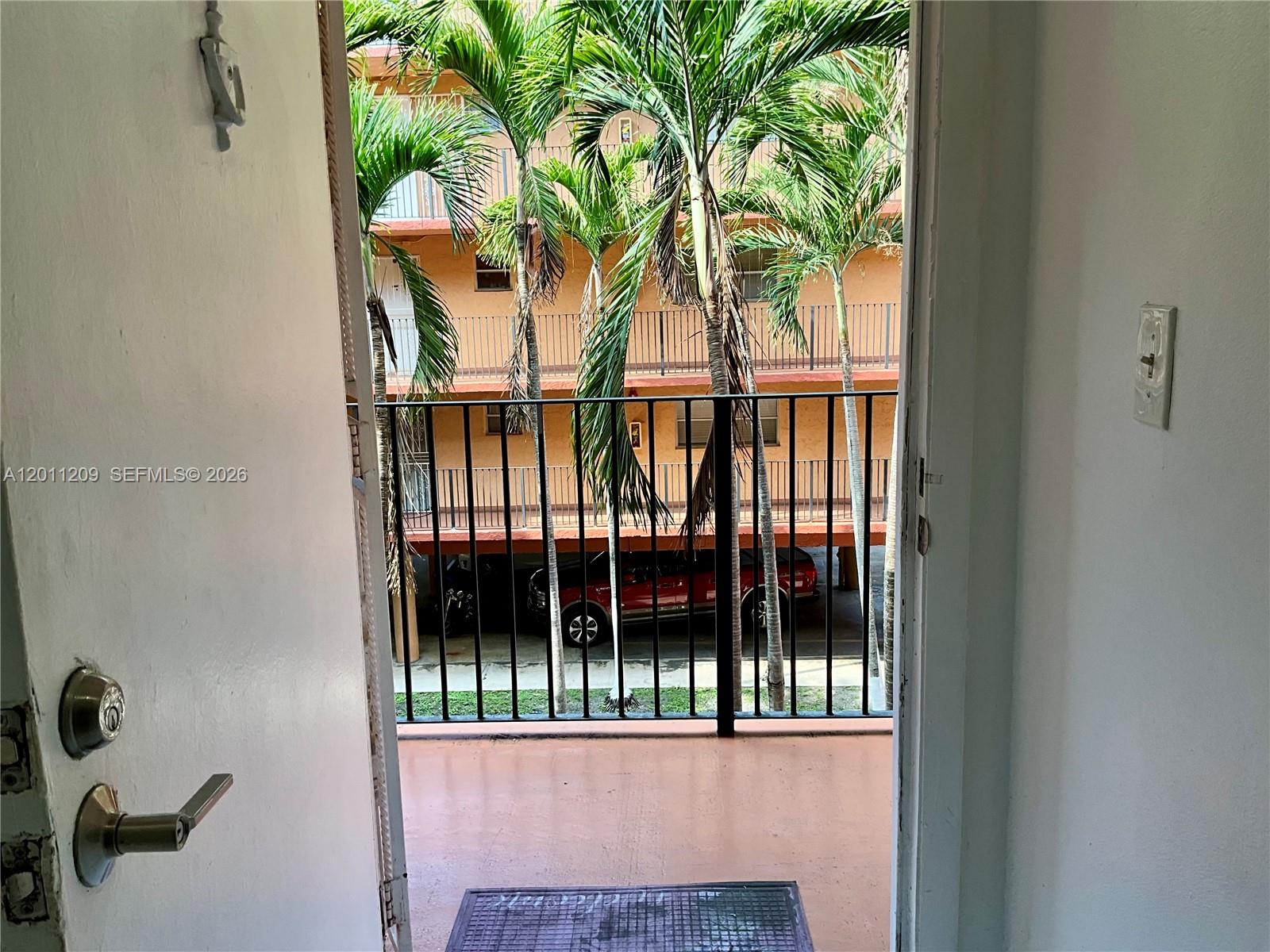 1910 West 56th Street, Unit 3226 Hialeah, FL 33012 - Photo 20 of 21 a view of entryway front of house
