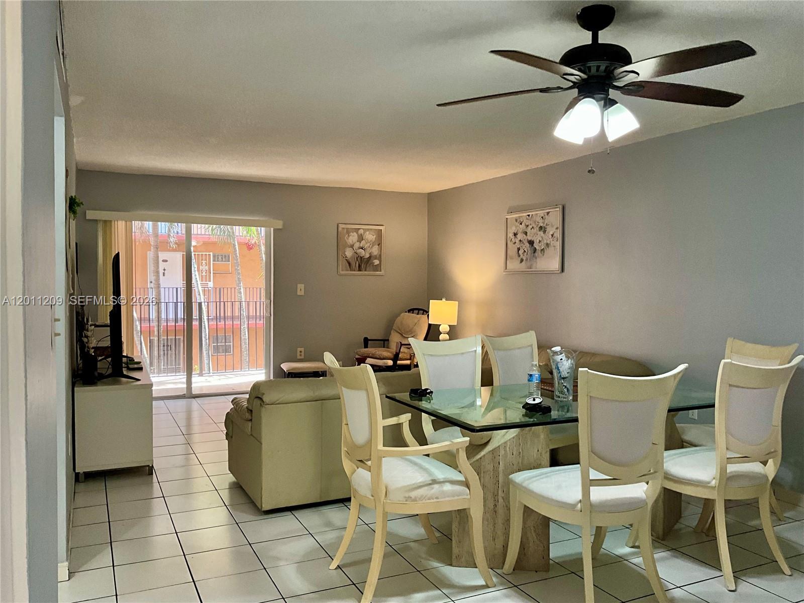 1910 West 56th Street, Unit 3226 Hialeah, FL 33012 - Photo 2 of 21 a dining room with furniture and window