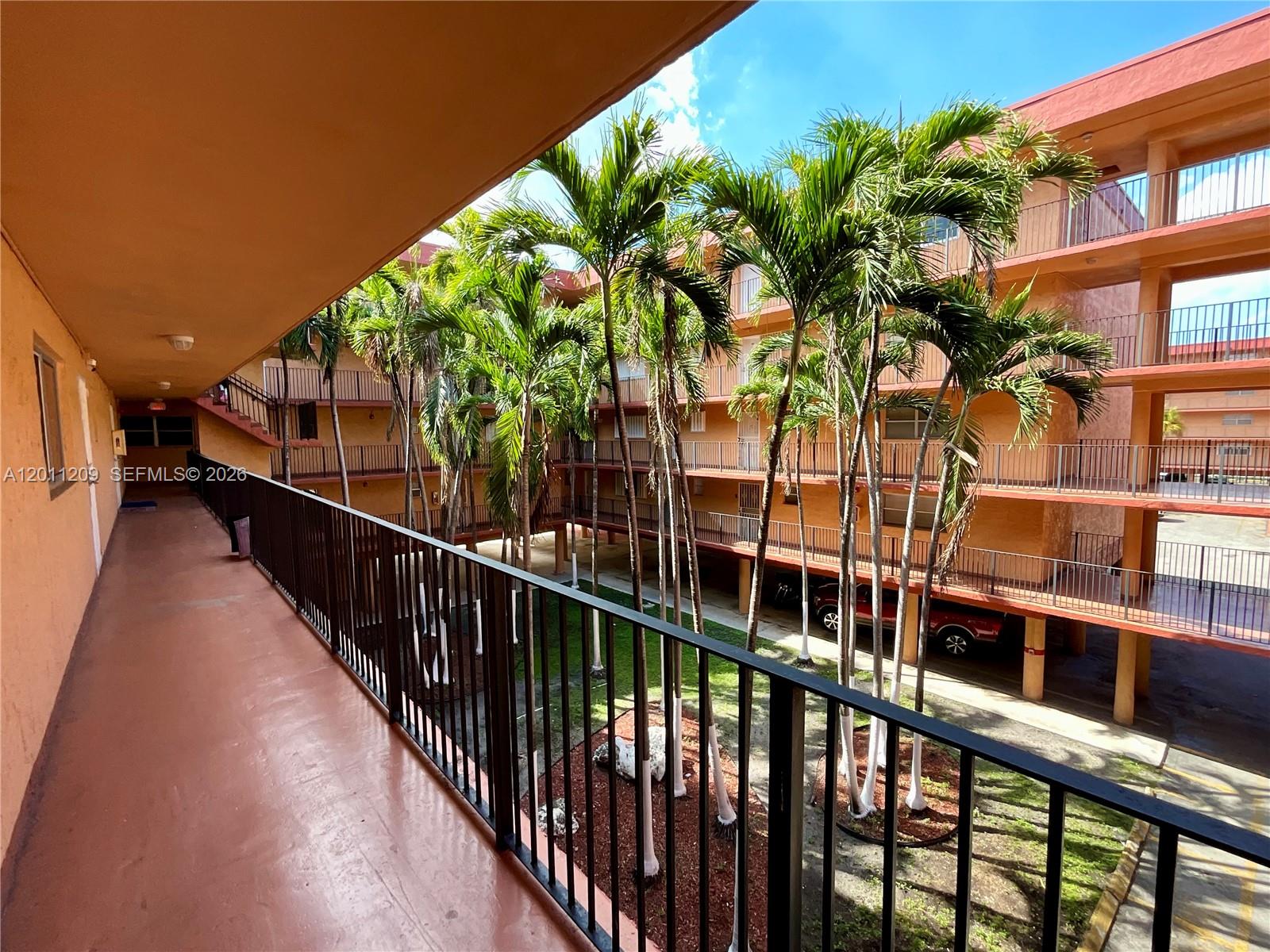 1910 West 56th Street, Unit 3226 Hialeah, FL 33012 - Photo 21 of 21 a view of a house with a balcony