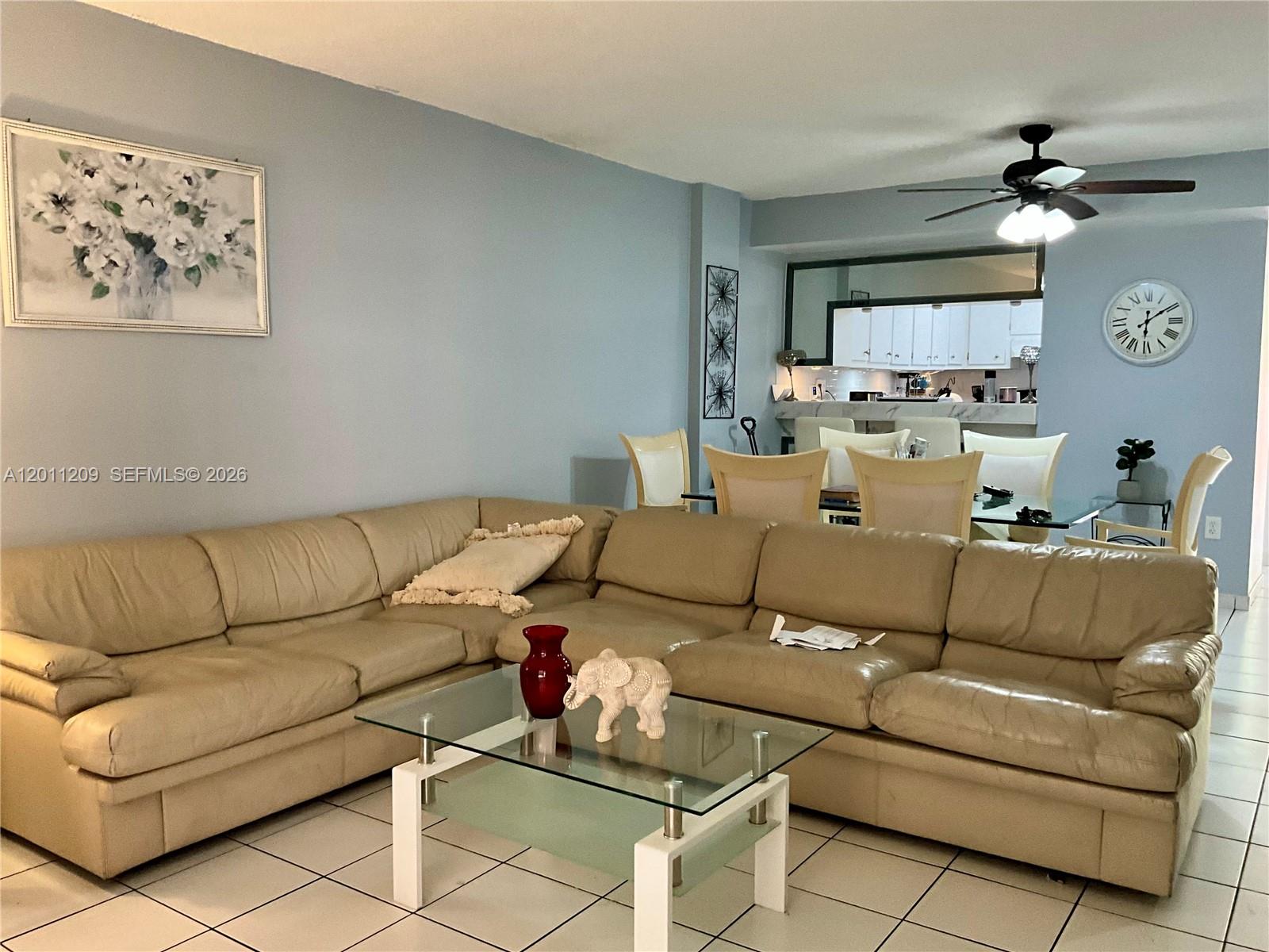 1910 West 56th Street, Unit 3226 Hialeah, FL 33012 - Photo 4 of 21 a living room with furniture