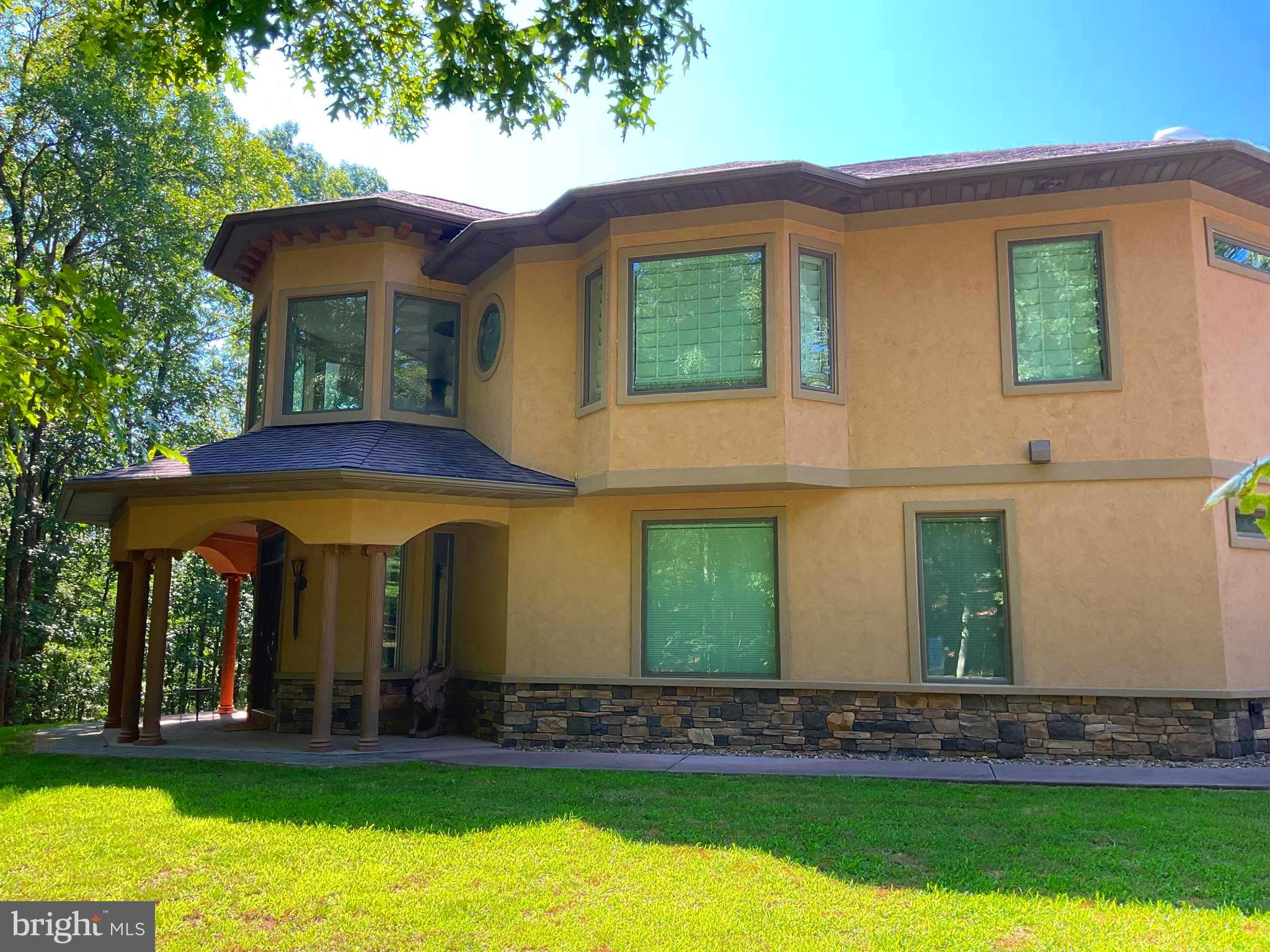 13200 Crossover Road Northeast Flintstone, MD 21530 - Photo 13 of 60 a front view of a house with garden