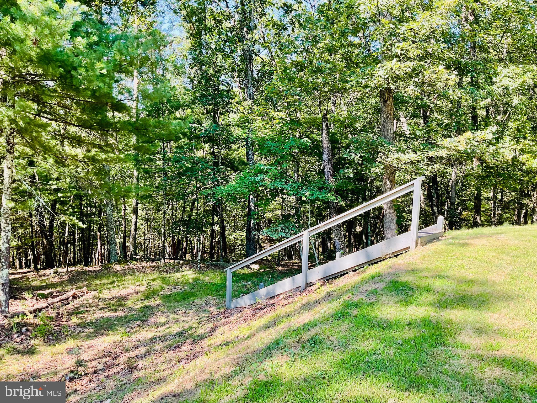 13200 Crossover Road Northeast Flintstone, MD 21530 - Photo 17 of 60 a view of an house with swimming pool