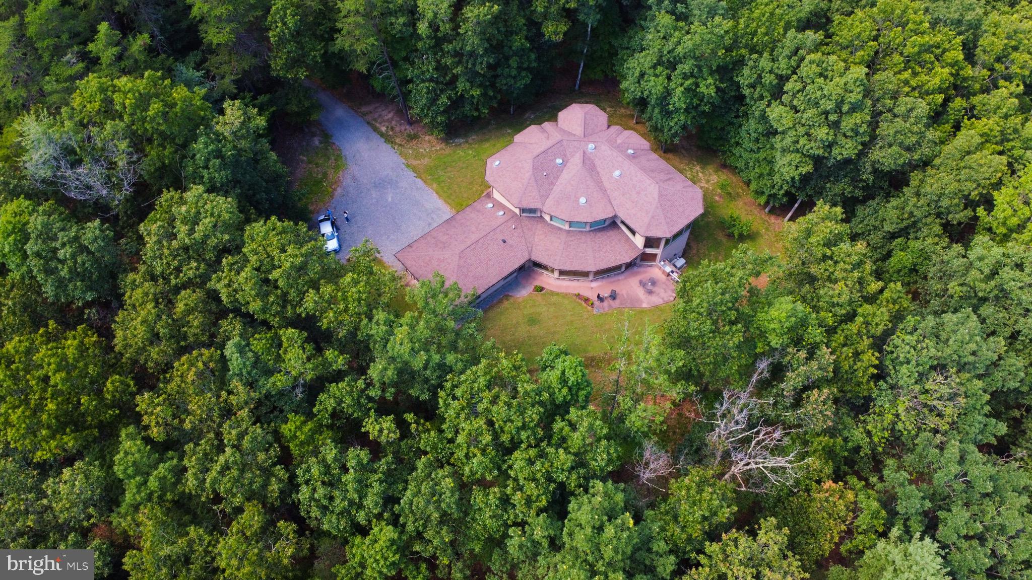 13200 Crossover Road Northeast Flintstone, MD 21530 - Photo 24 of 60 an aerial view of a house with a swimming pool and a yard
