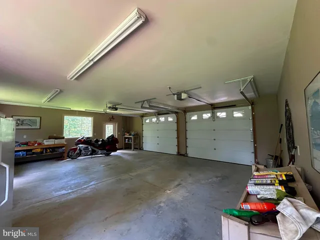 a living room with furniture and windows