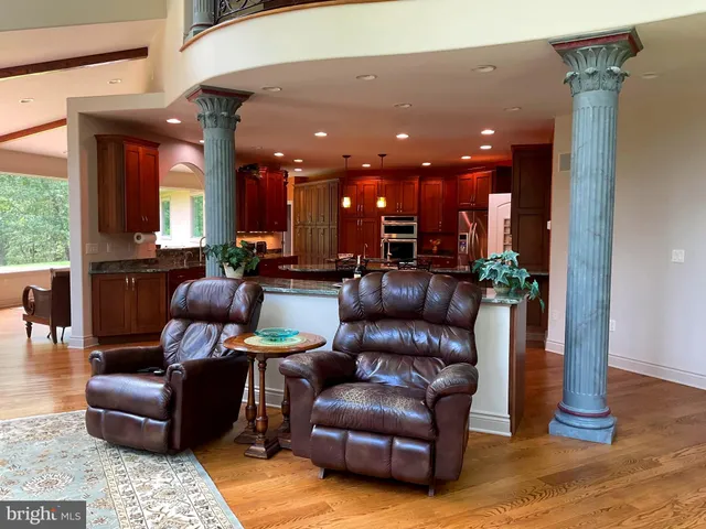 a kitchen with granite countertop lots of counter top space and dining table