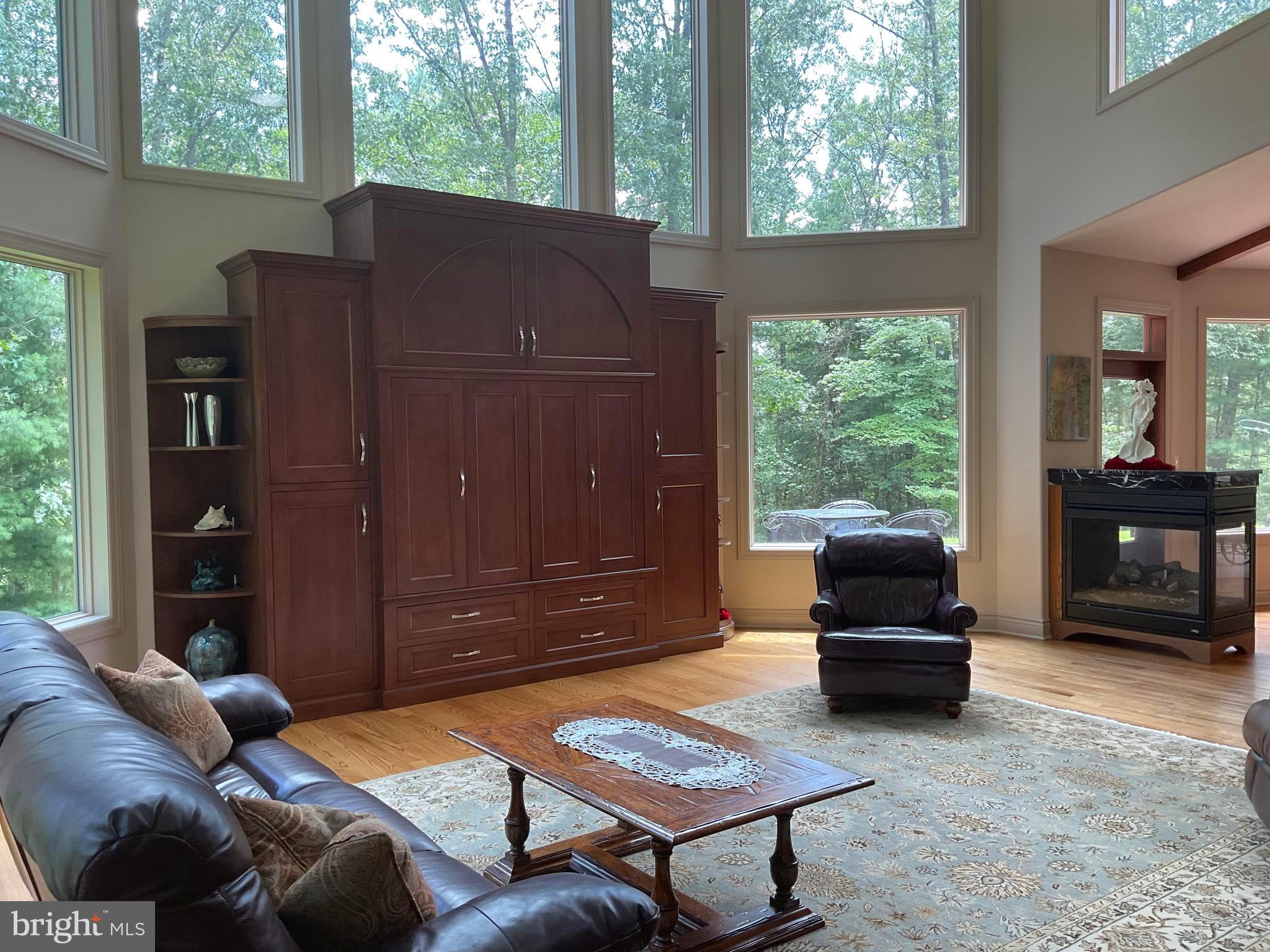 13200 Crossover Road Northeast Flintstone, MD 21530 - Photo 35 of 60 a outdoor living space with furniture and a floor to ceiling window