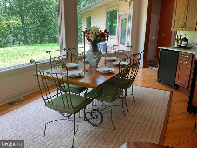 a bathroom with a tub and a shower
