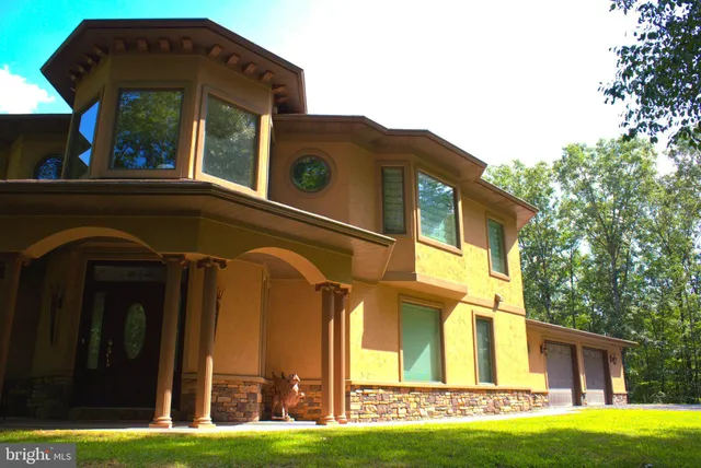 a front view of house with yard