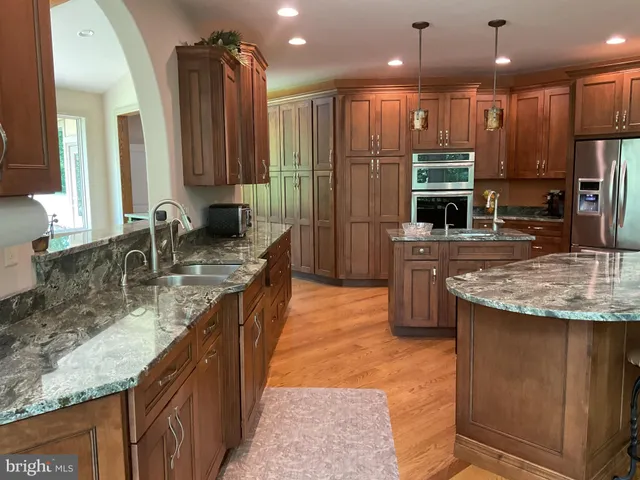 a living room filled with furniture and a window