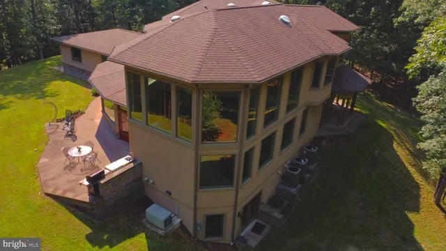 a view of a house with a swimming pool