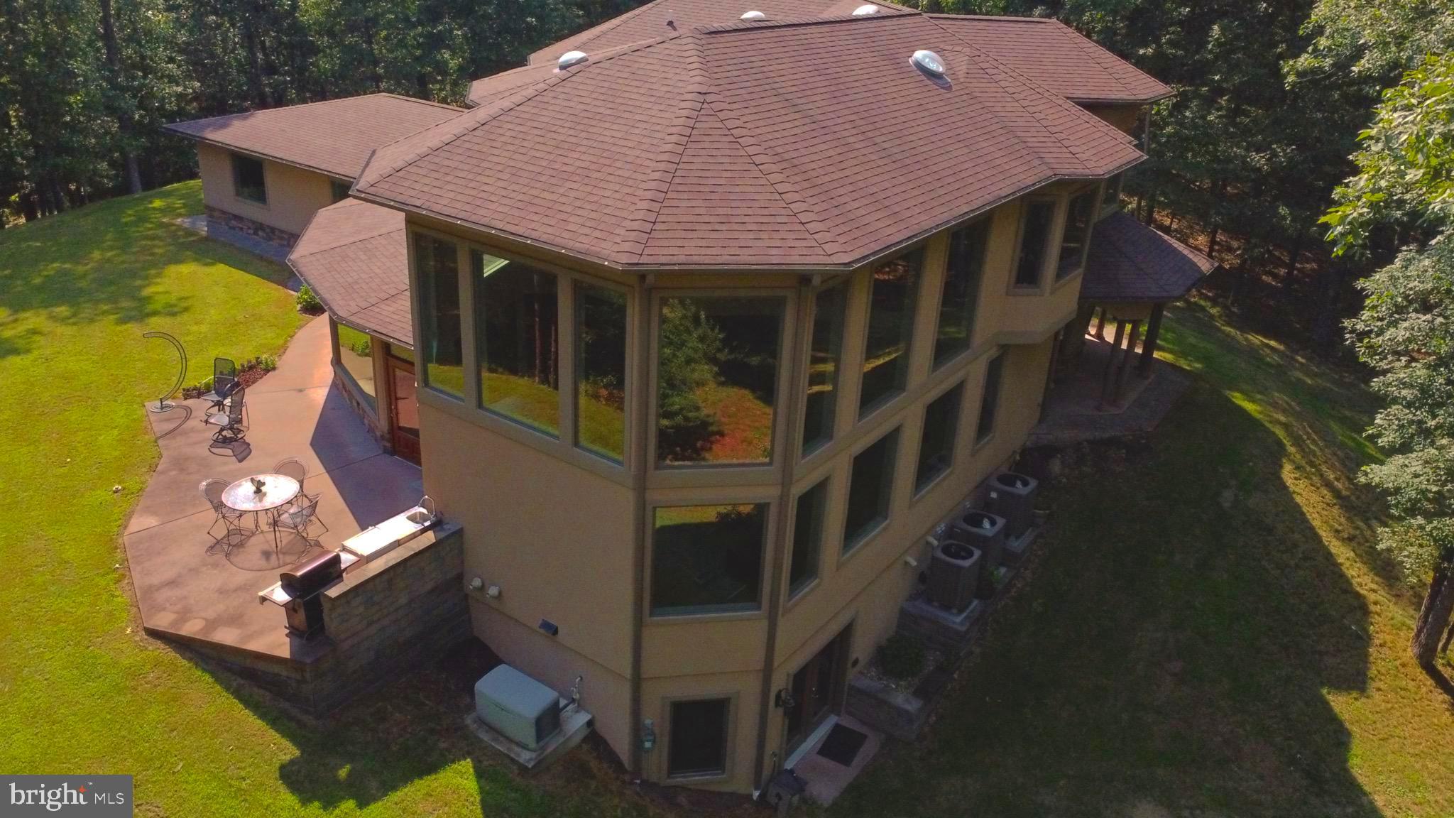13200 Crossover Road Northeast Flintstone, MD 21530 - Photo 6 of 60 an aerial view of a house with swimming pool and porch