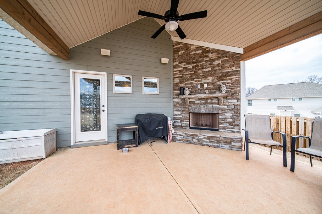 8066 Hayfields Road Columbus, GA 31904 - Photo 44 of 49 Enjoy the game day porch with wood burning firepla