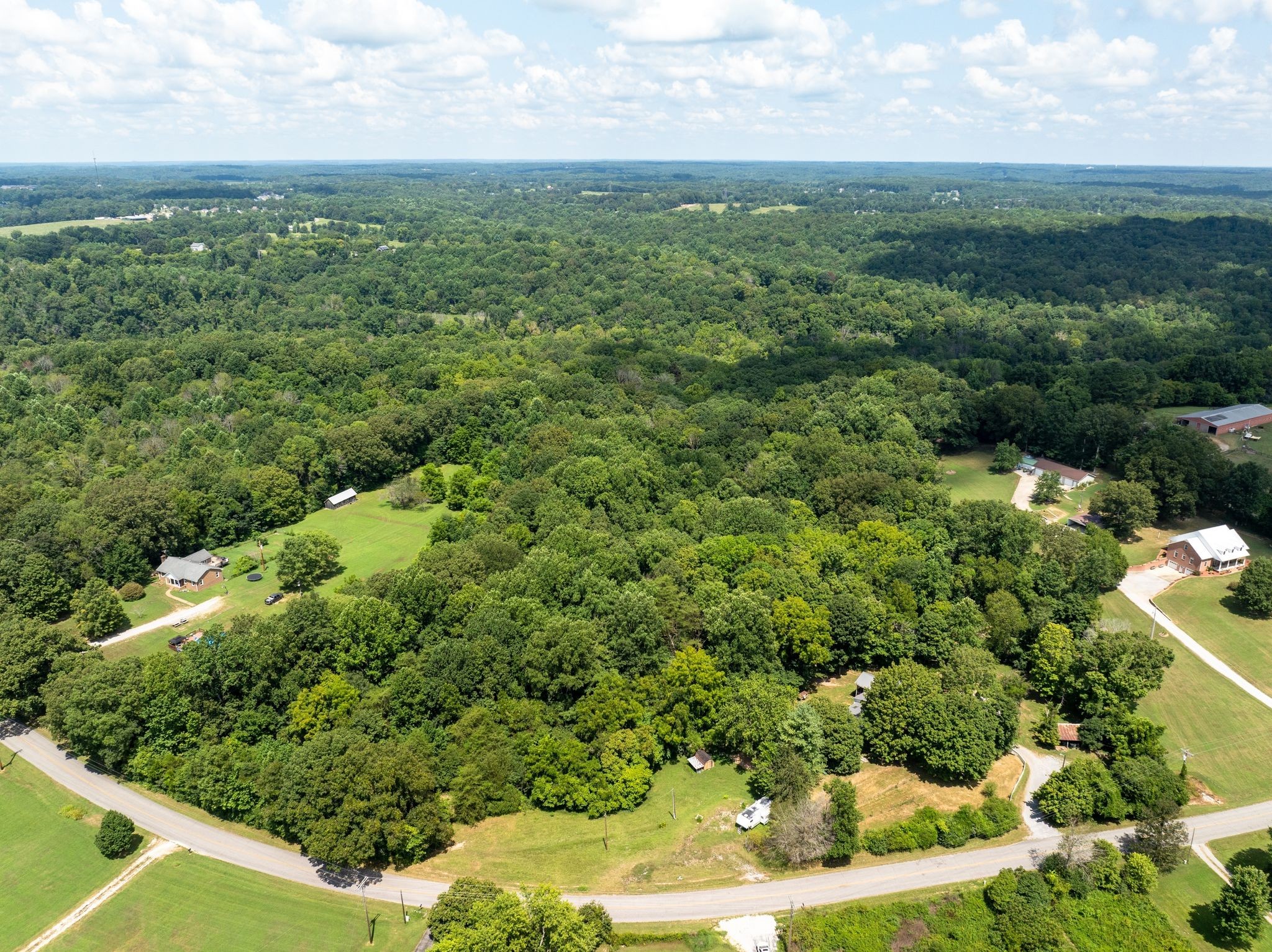1374 Deal Road Burns, TN 37029 - Photo 3 of 21 a view of a green field