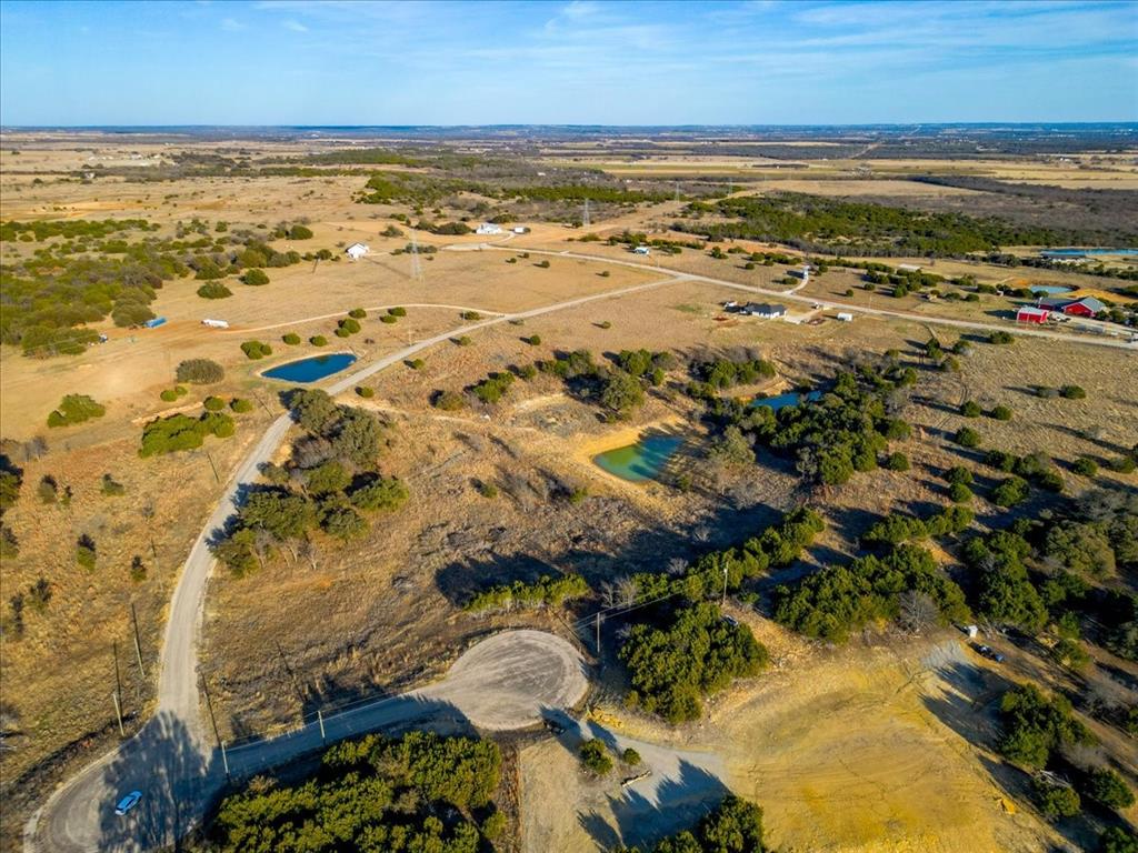 30 Crest Ridge Mineral Wells, TX 76067 - Photo 2 of 10 a view of an ocean and beach
