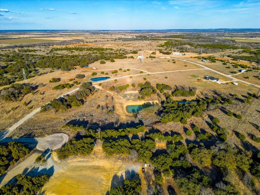 30 Crest Ridge Mineral Wells, TX 76067 - Photo 6 of 10 a view of an ocean and beach