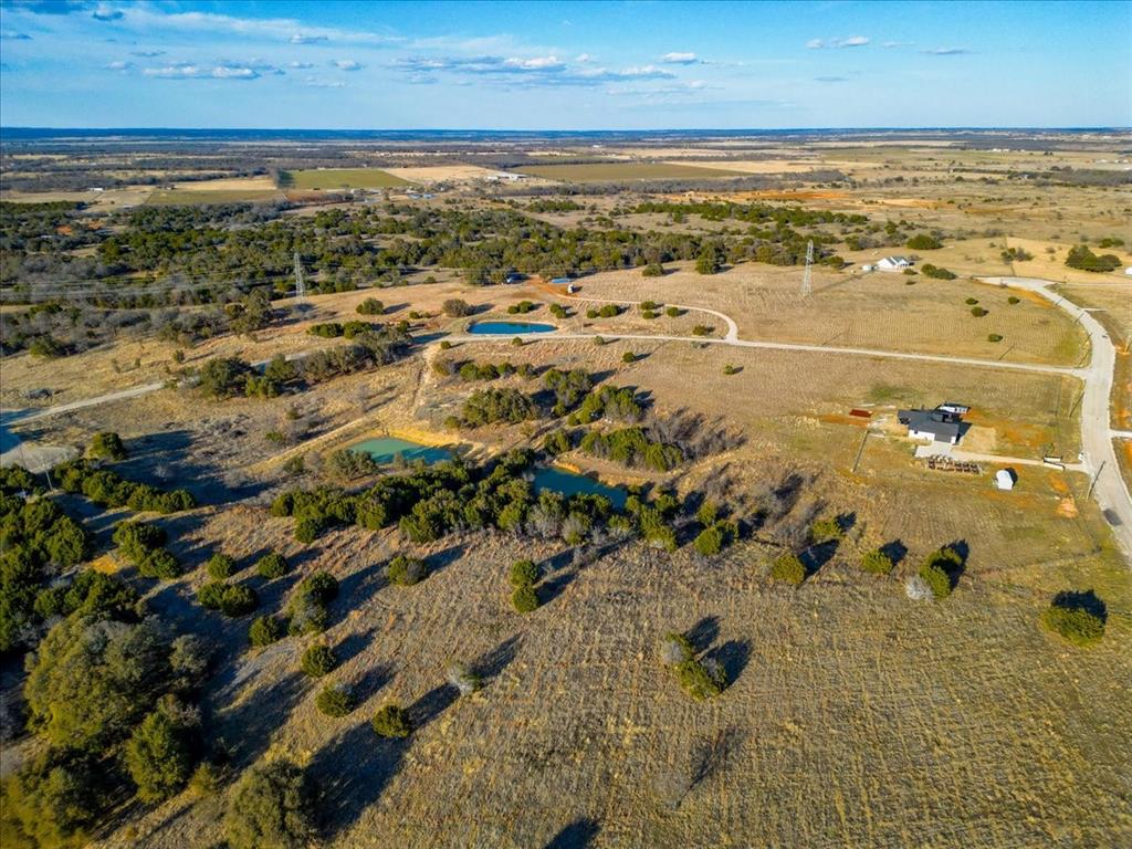 30 Crest Ridge Mineral Wells, TX 76067 - Photo 7 of 10 a view of an ocean and beach