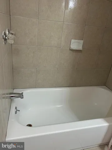 a bathroom with a bathtub