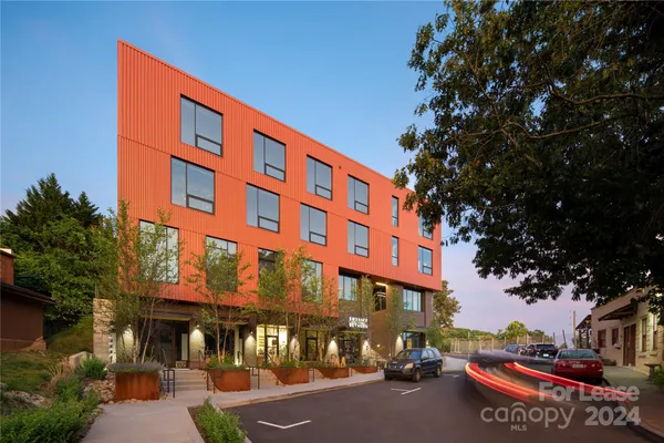 a front view of a building with street view